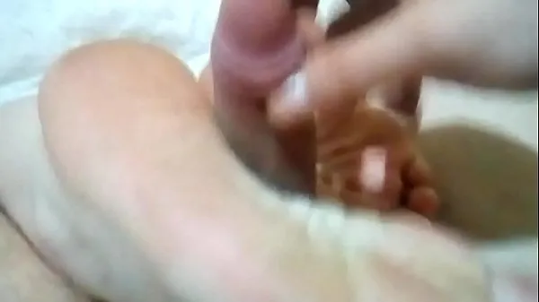 Stora Quick footjob with cum on soles cute toes megavideor