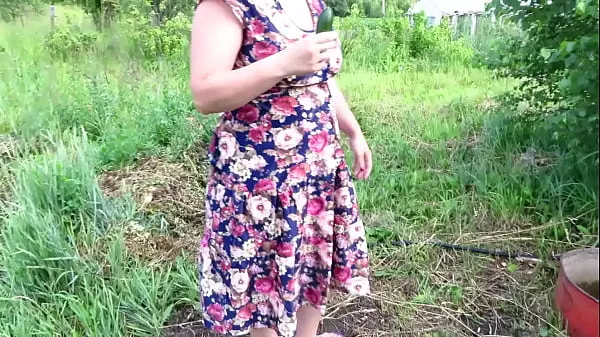 Big Busty milf masturbates with cucumber and strawberries outdoors in a public place Juicy PAWG and big tits in nature Fetish mega Videos