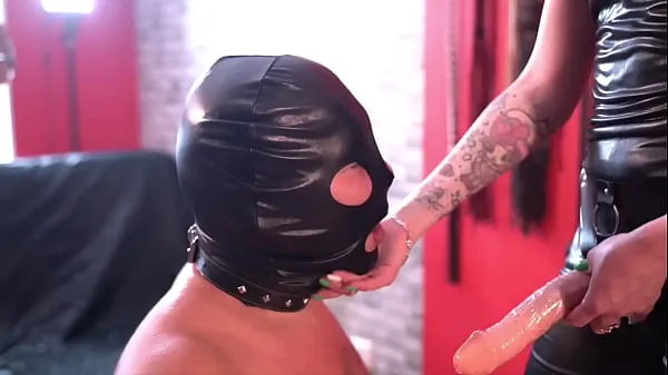Big Dominatrix Nika loves to fuck her in the mouth with a strapon. Watch how this tries to suck deep mega Videos