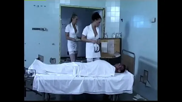 Big Two horny nurses play with a patient's cock mega Videos